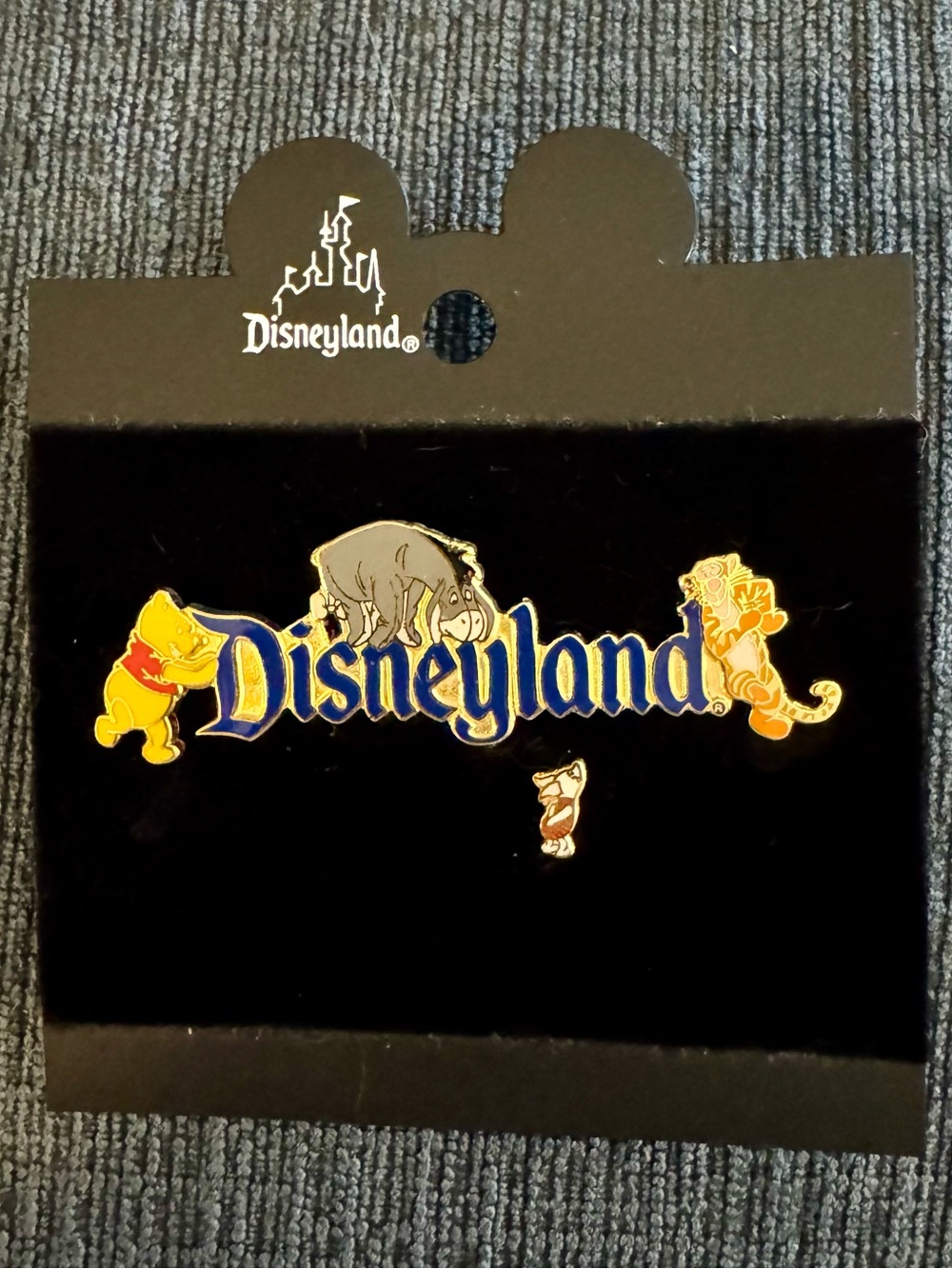 Disneyland Logo Pin with Pooh, Eeyore, Tigger, Piglet